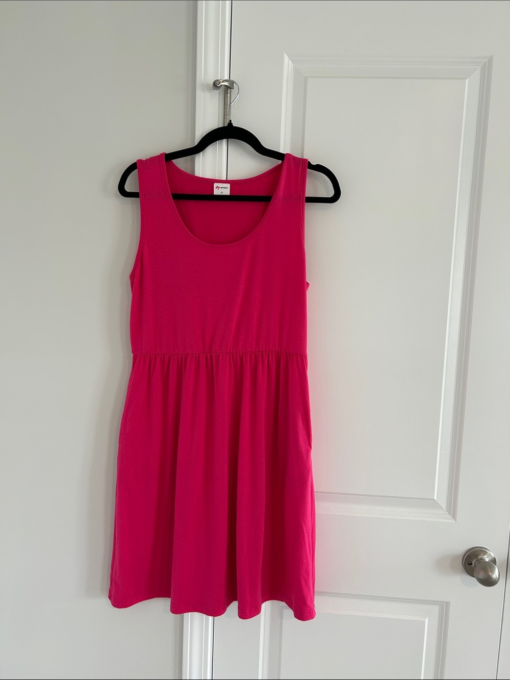 Woman’s Sleeveless Knit Mini Dress in Bright Pink